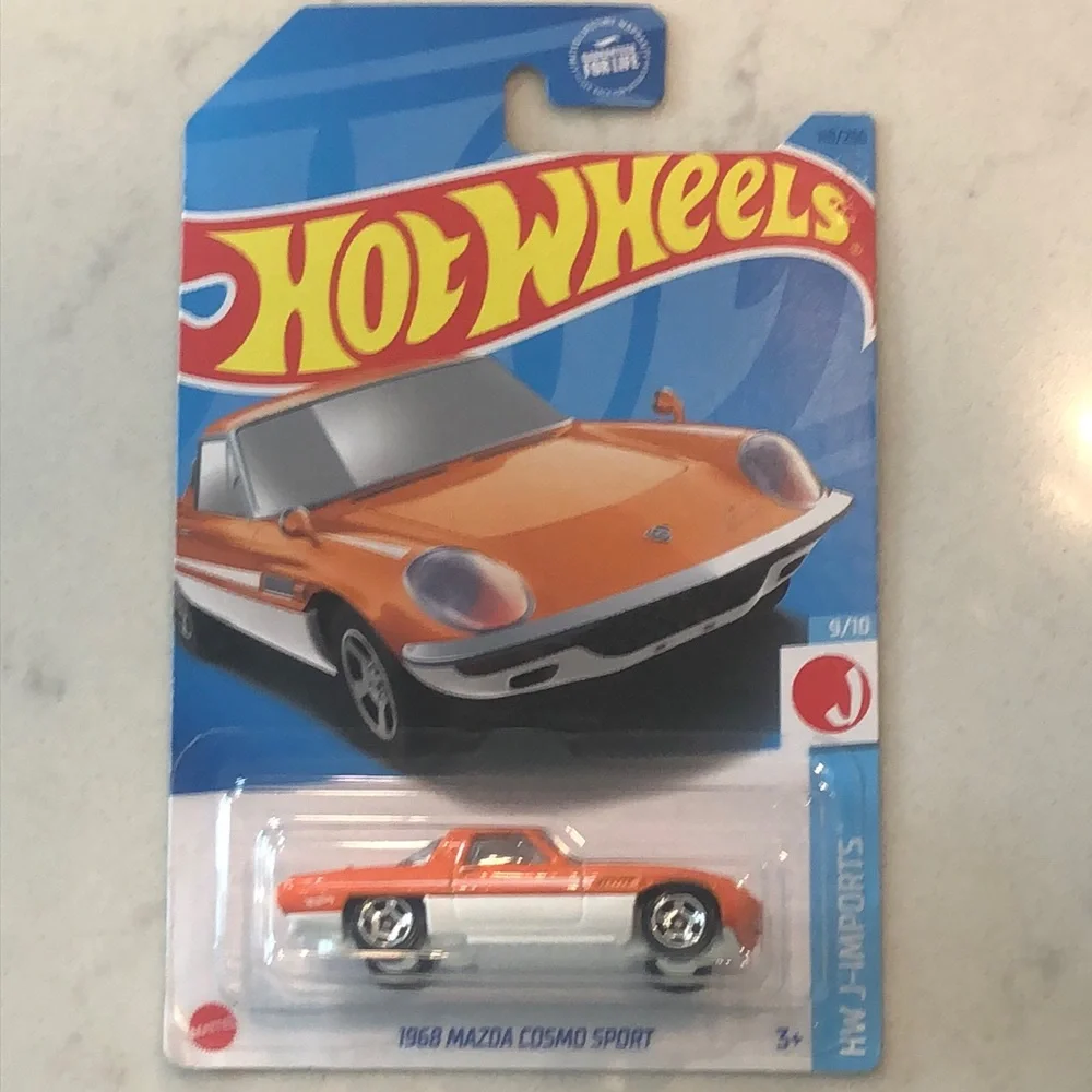 Orange and White 1968 Mazda Cosmo Sport